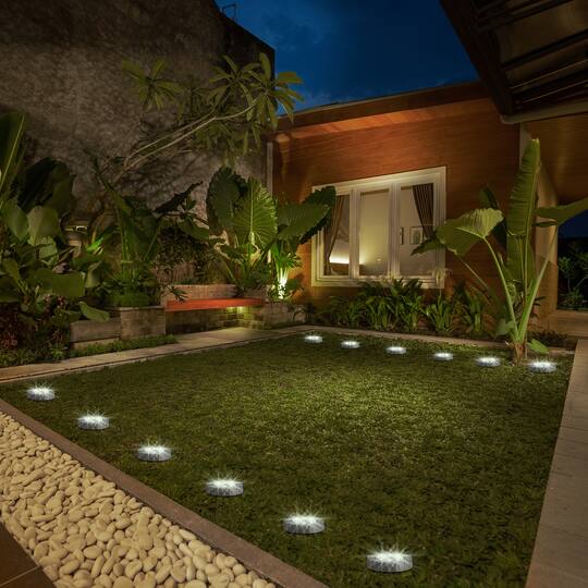 Glitzhome® 5.25" Solar Powered Disk Outdoor Pathway Lights, 4ct.